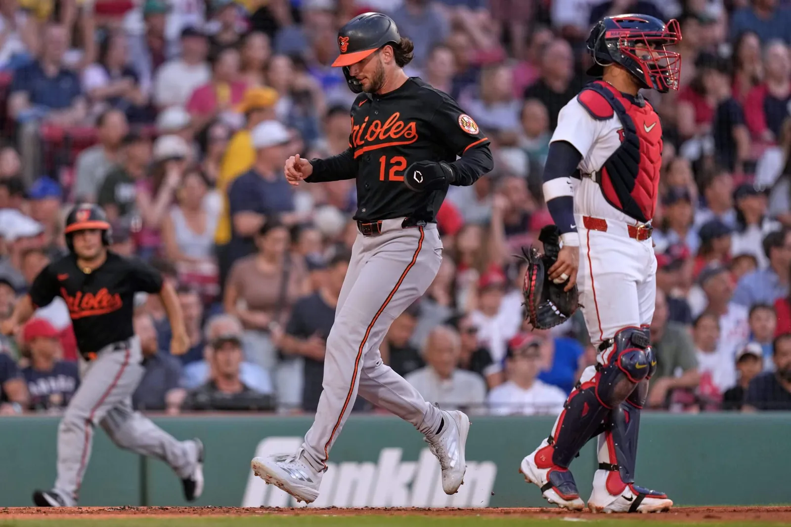 Baltimore Orioles' Dylan Beavers scores on Wednesday.