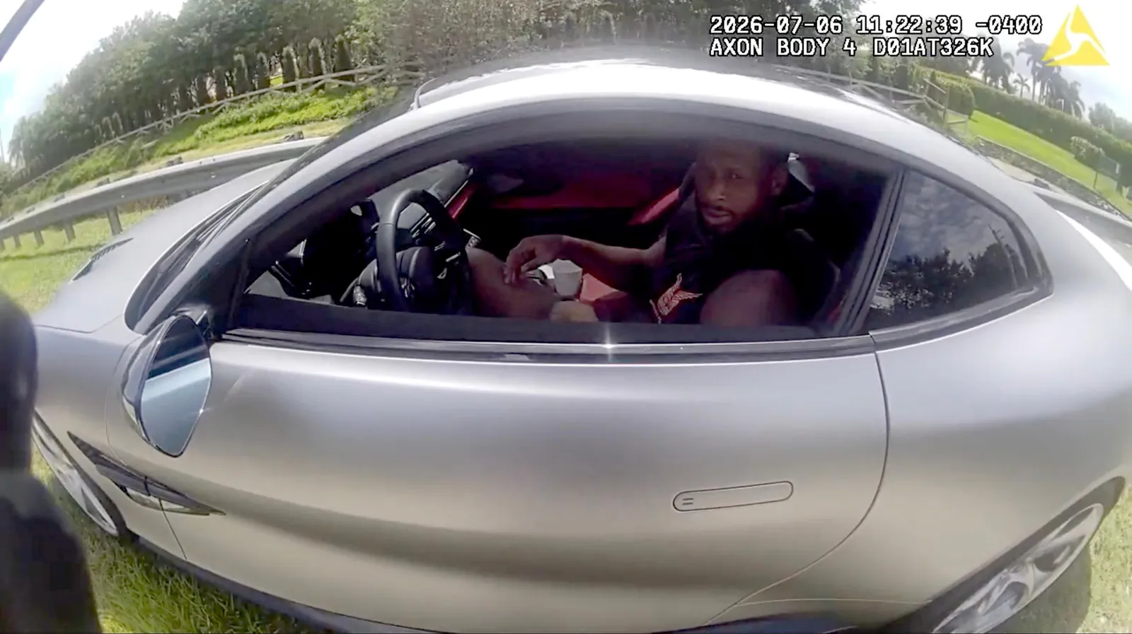 Geno Smith in his car, caught on body camera video.