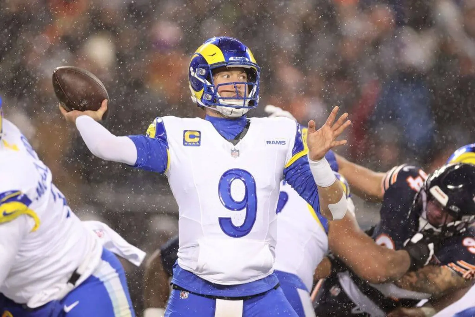 Rams QB Matthew Stafford throws a pass during a playoff game against the Chicago Bears