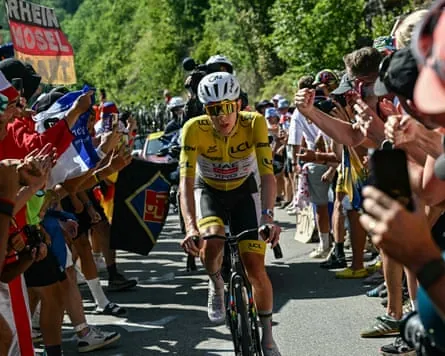 Tadej Pogacar chases down the lead breakaway group on the Alpe d'Huez ascent.